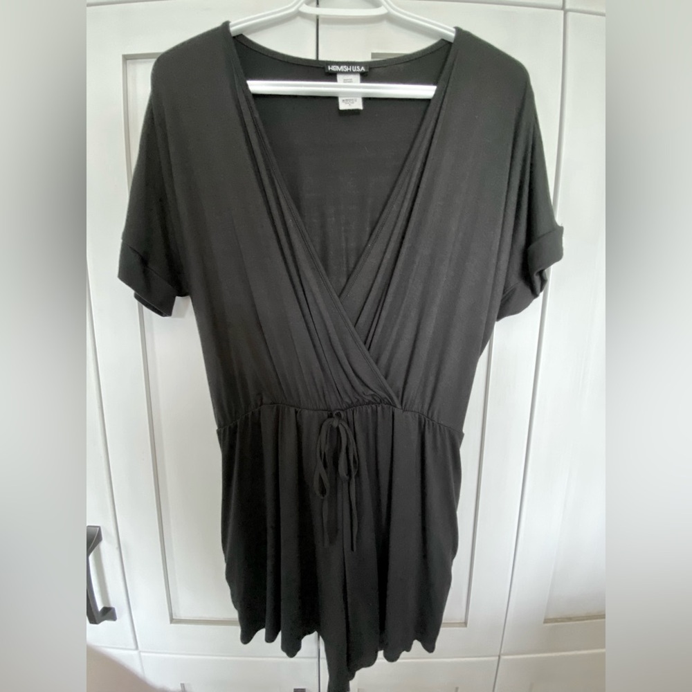 V-neck black romper with tie detail at waist. Size S.